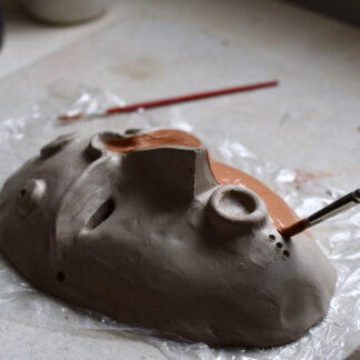 Maskers maken van klei
